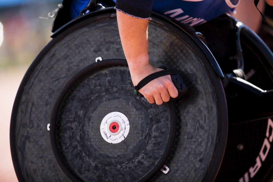 Close-up-of-para-athlete-in-wheelchair-on-athletics-track.jpg